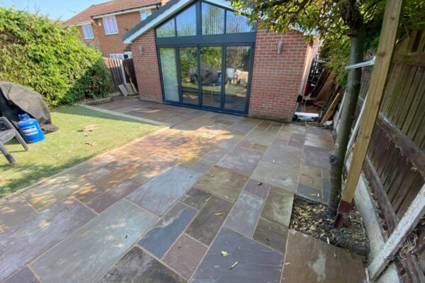 Modern Flagstone Patio with artificial grass
